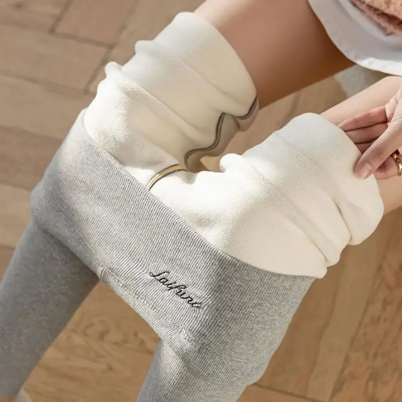 

Женские утепленные брюки-леггинсы на флисе с высокой талией и ребристой отделкой для осени и зимы