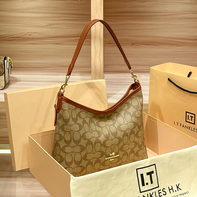 

Leather commuter tote bag women's 2025 new spring and summer large-capacity shoulder crossbody underarm bucket bag