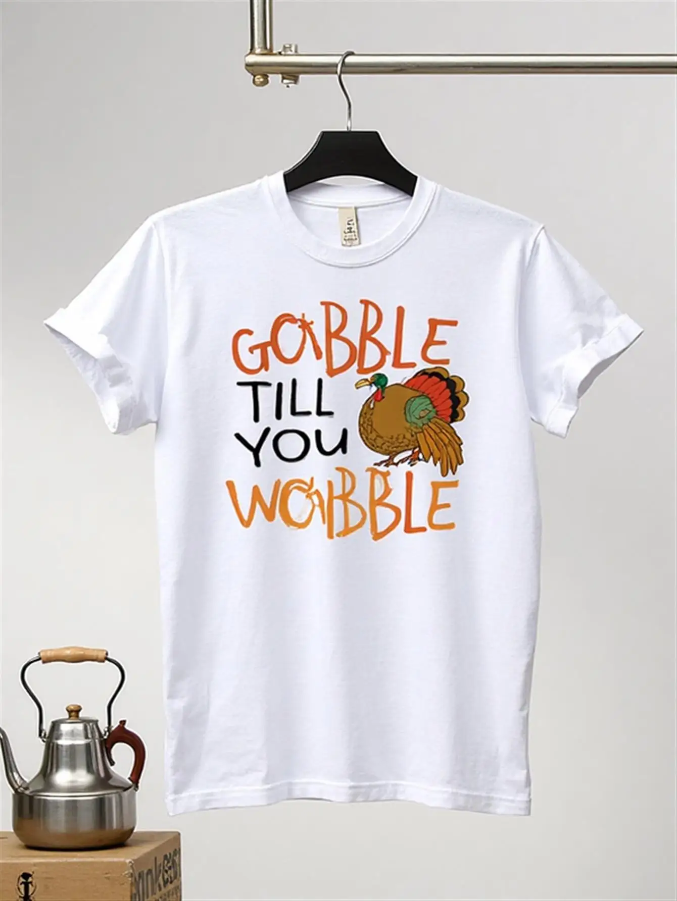 

T-Shirt with a Rolling Turkey Print, 100% Pure Cotton, Casual Round-Neck Short-Sleeve Shirt with a Funny Turkey Face and Leg Design, Suitable for Thanksgiving Party Outfits, Holiday Gift for Men - White Theme