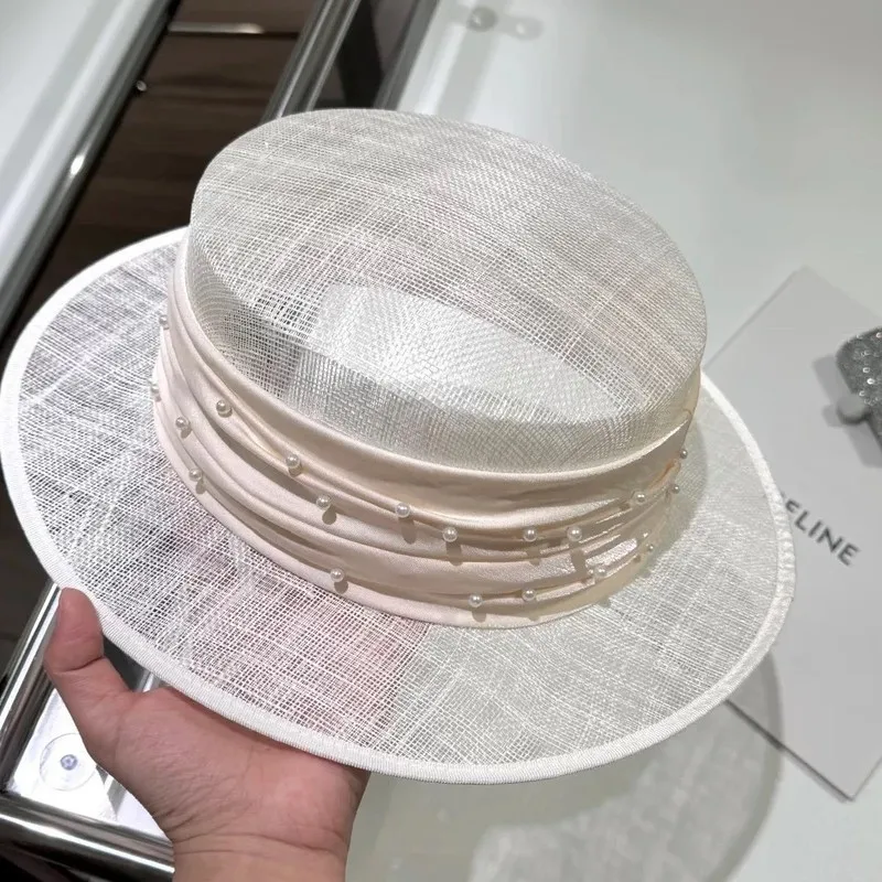 Elegant and Noble Women's Pearl Silk Linen Hollow Straw Hat for Spring and Summer Chic and Dignified Sunshade Flat Top Hats