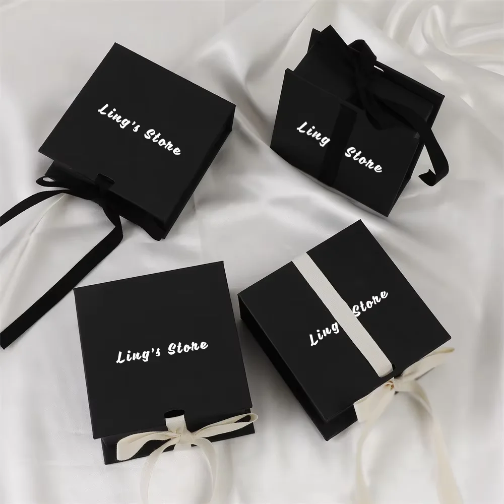 

24/50/100Pcs 9.3×9.5×3.5cm Jewelry Packaging Box Ribbon Fashion Bowknot Flap Boxes With Sponge For Earring Ring Bag Storage