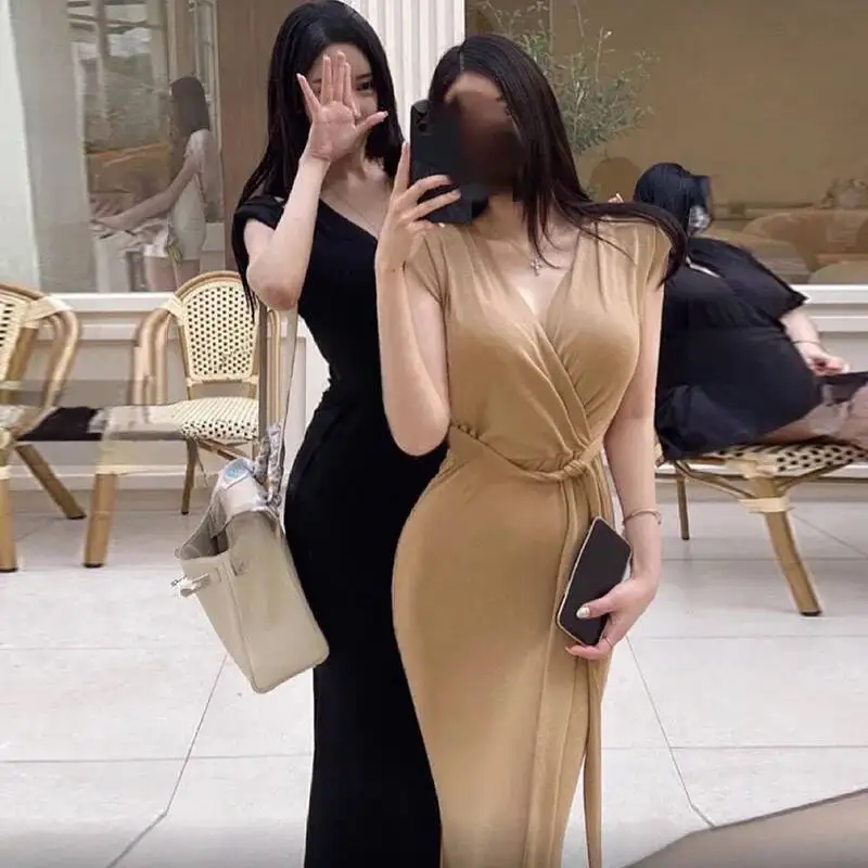 Corea sexy vita-serraggio cravatta spalla imbottita profondo scollo a V elegante abito lungo senza maniche moda donna sexy top UTW2