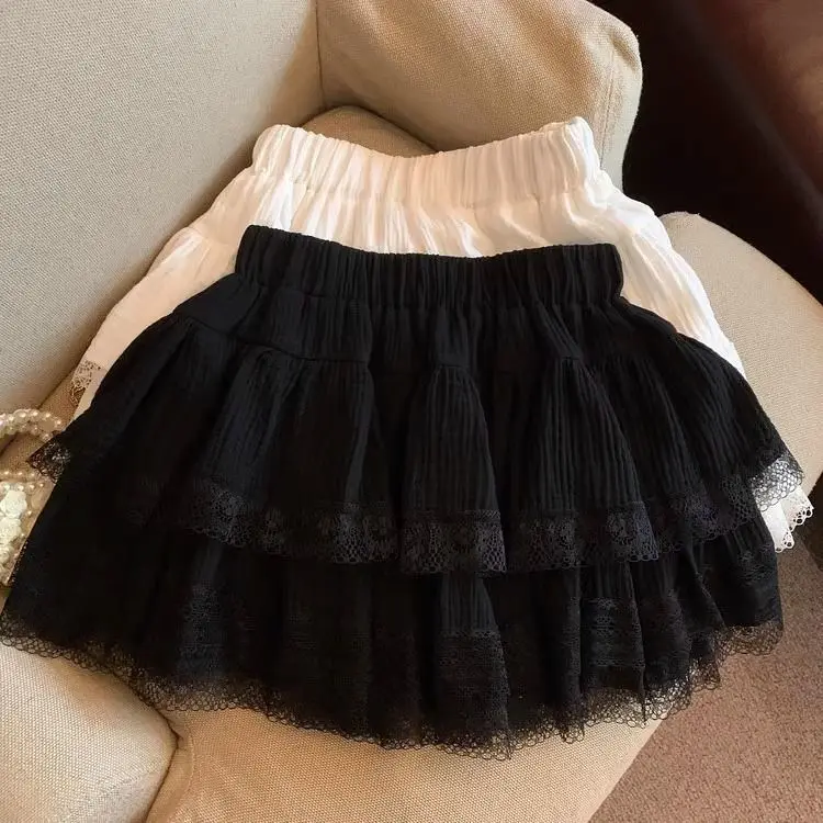 Dulce pastel hinchado faldas de mujer kawaii encaje patchwork negro Mini falda Campus Harajuku Casual versátil cintura elástica falda sólida