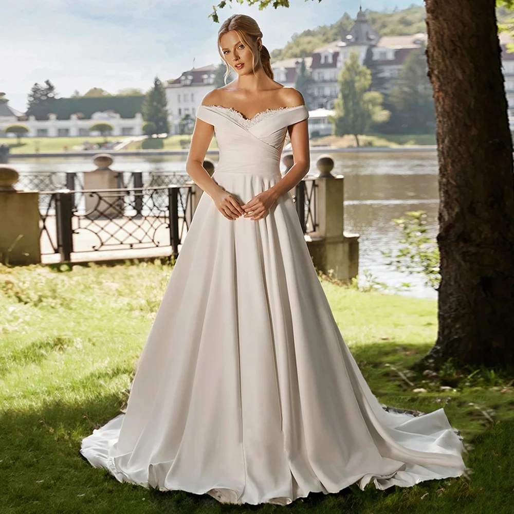 Exquisite A-Linie Brautkleider Ärmellos Elfenbein Spitze Brautkleider Gericht Zug Vestido De Novia Exquisite Neue Robe De Sommer
