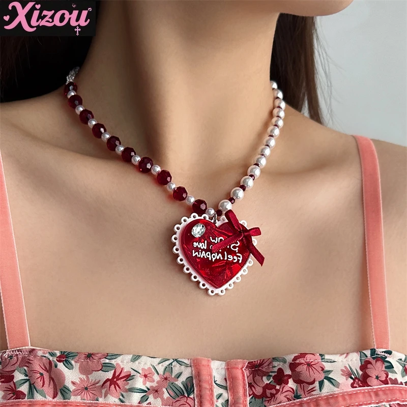 

Sweet and cool princess wind peach heart bow pearl necklace women's 2025 new niche sweet sister collarbone sweater chain