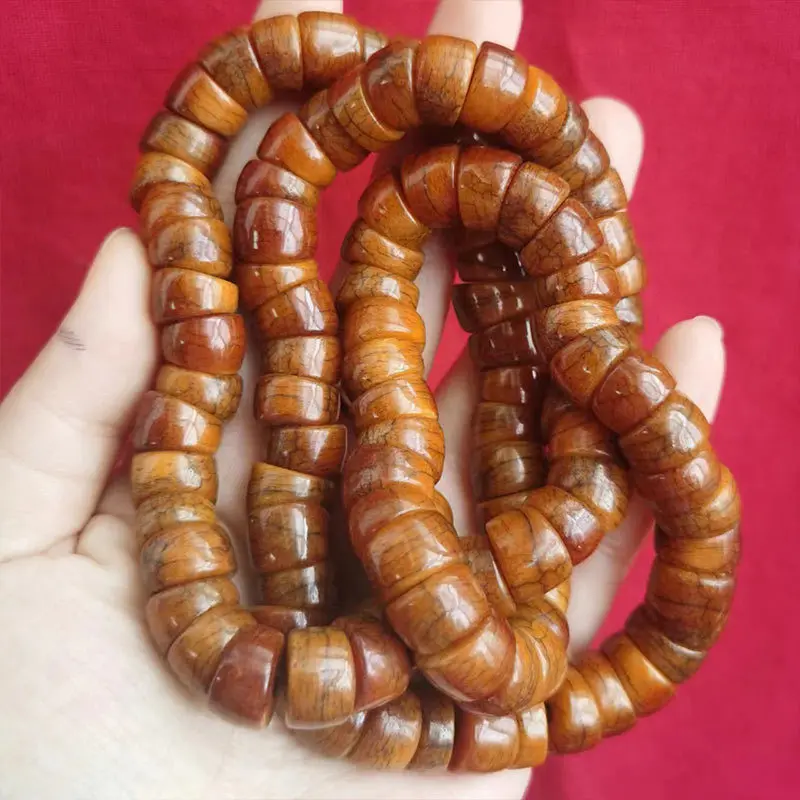 Cow , camel bone and intestine beads – a 108-bead bracelet made from old recycled bones including pig large intesti
