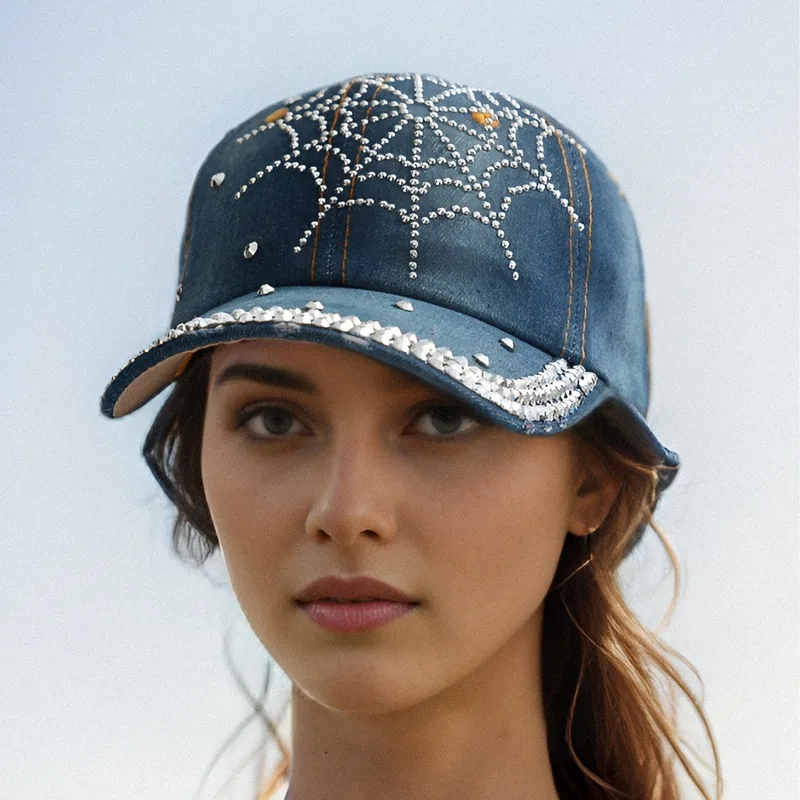 Men's women's style baseball cap with sparkling rhinestone three-dimensional spider web design, curved brim, and rivets,