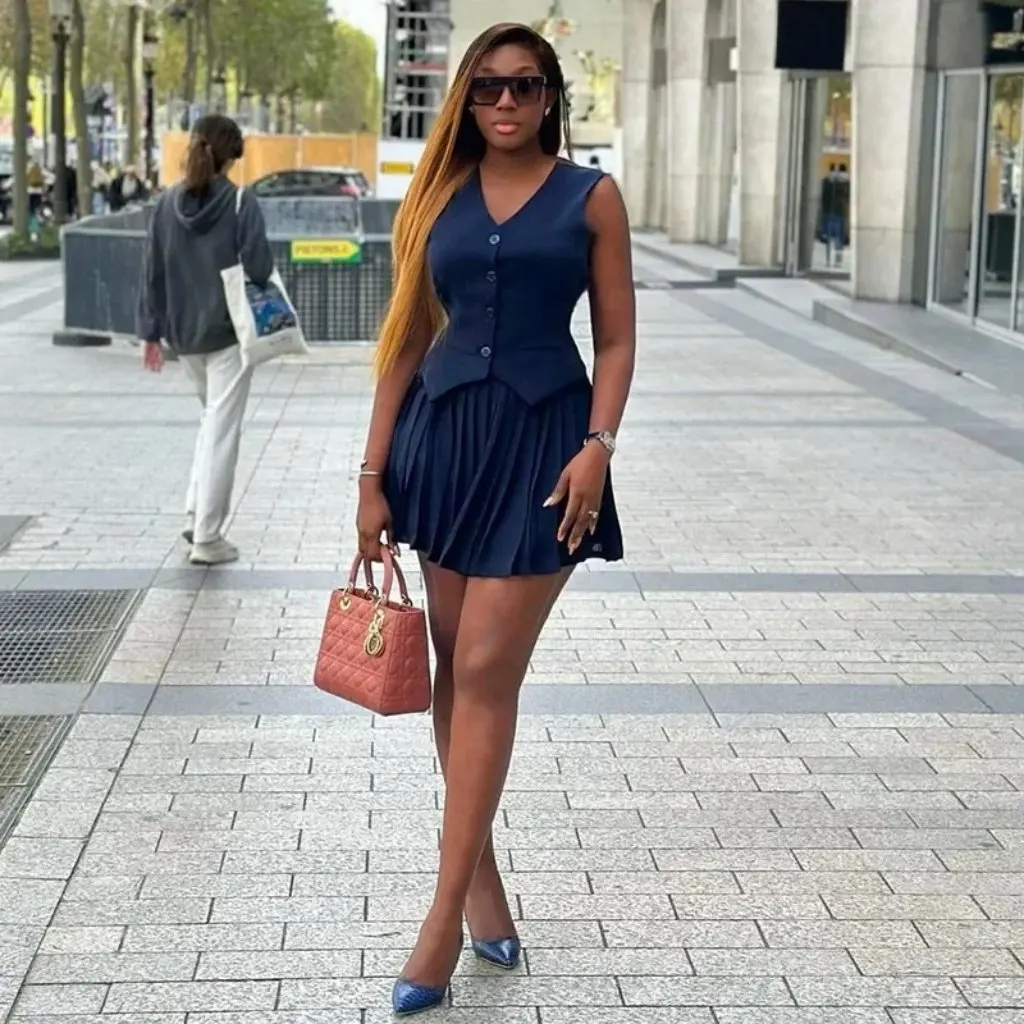 

Women's Solid Color V-Neck Sleeveless Vest Top And Pleated Skirt Set European American Style Summer New Clothing