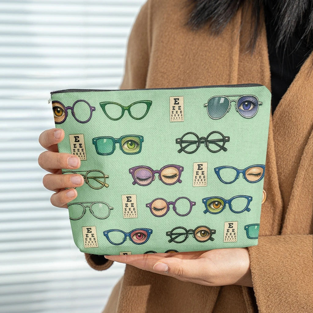 A Makeup Bag, Featuring Various Styles of Glasses Neatly Arranged, a Linen Cosmetic Pouch, Zippered Makeup Bag for Women