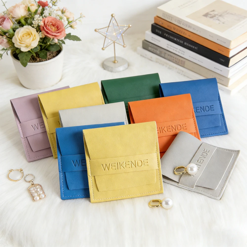 

Customized 50 Luxury Jewelry Packaging Gift Bag PU Leather Travel Organizer Pouches For Earrings Bracelet Keychain Charger Sack