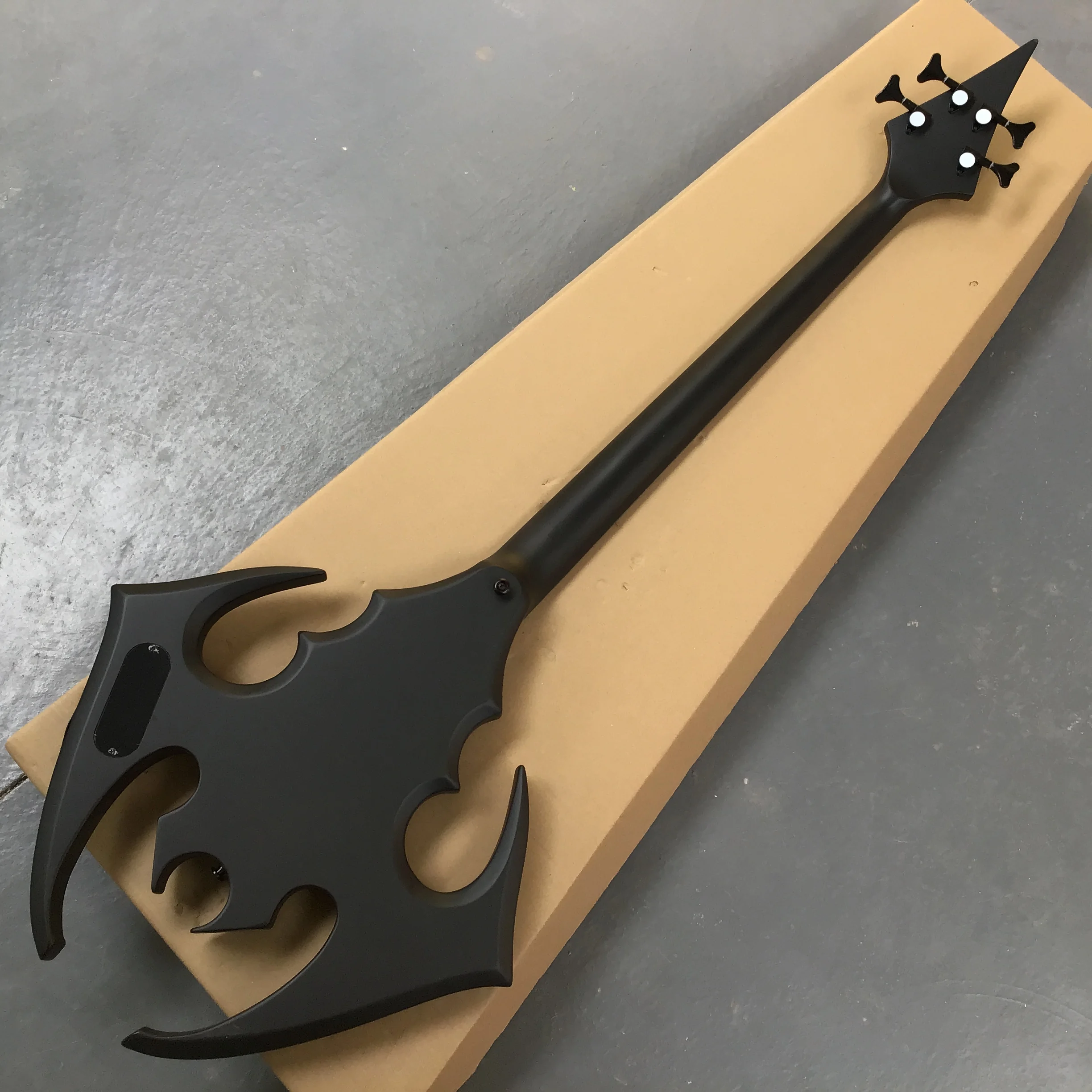 hot sales irregularity Bat shape 4-string electric  bass guitar, perfect tone black hardware hot sale in stock customizable