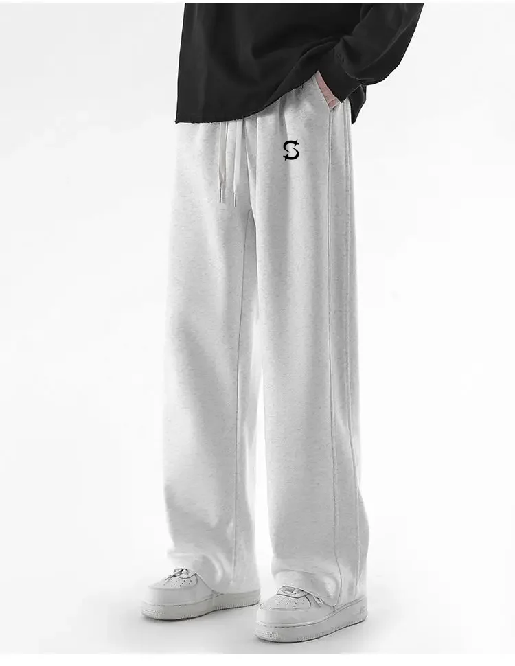 Pantalones deportivos con patrones creativos americanos para hombre, ropa de calle informal negra holgada, ropa de calle para hombre, ropa de calle