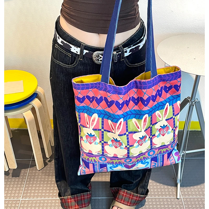 ELFSACK 2025 الخريف الوافدين الجدد لطيف الكرتون الأرنب كل انحاء طباعة حقيبة كتف لطيف حمل للمرأة