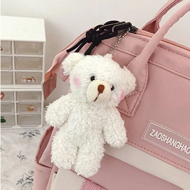 Borsa da scuola in Nylon per Laptop zaino da viaggio per ragazza adolescente con ciondolo orso Kawaii zaino da campeggio impermeabile