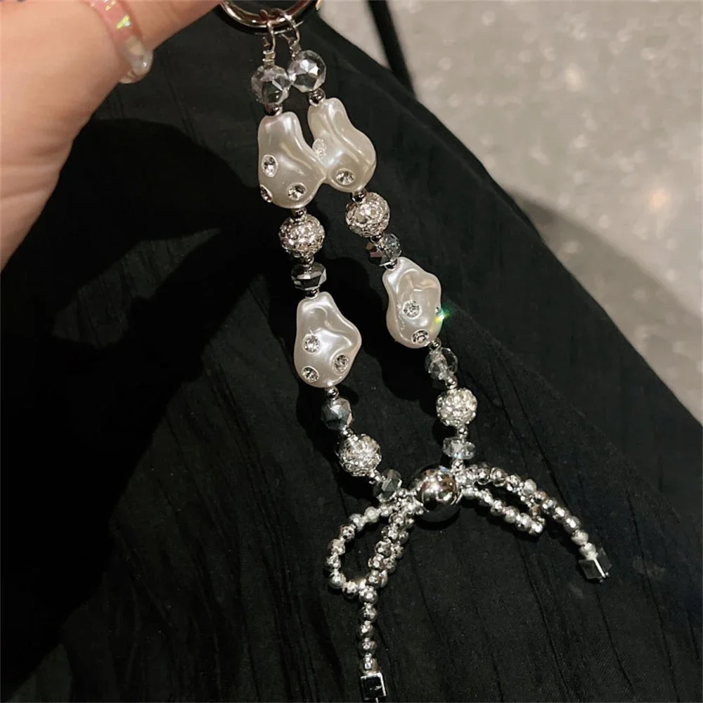 

Роскошный браслет с жемчужинами и кристаллами для IPhone 16 15