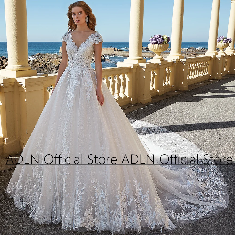 

Gorgeous Wedding Dresses Cap Sleeve Scoop Neck Applique Lace Glitter Tulle A Line Chapel Train Bridal Dress Vestido Novia