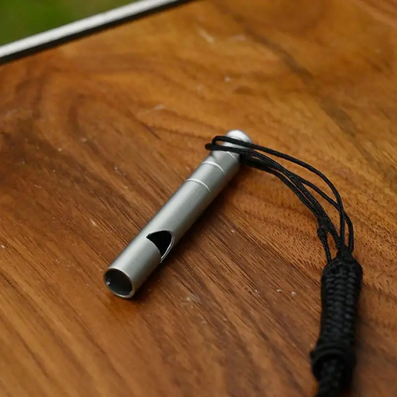 

Outdoor Survival Safety Whistle Camping Hiking Trip Exploring Whistle Titanium Alloy Emergency Whistle With Cord