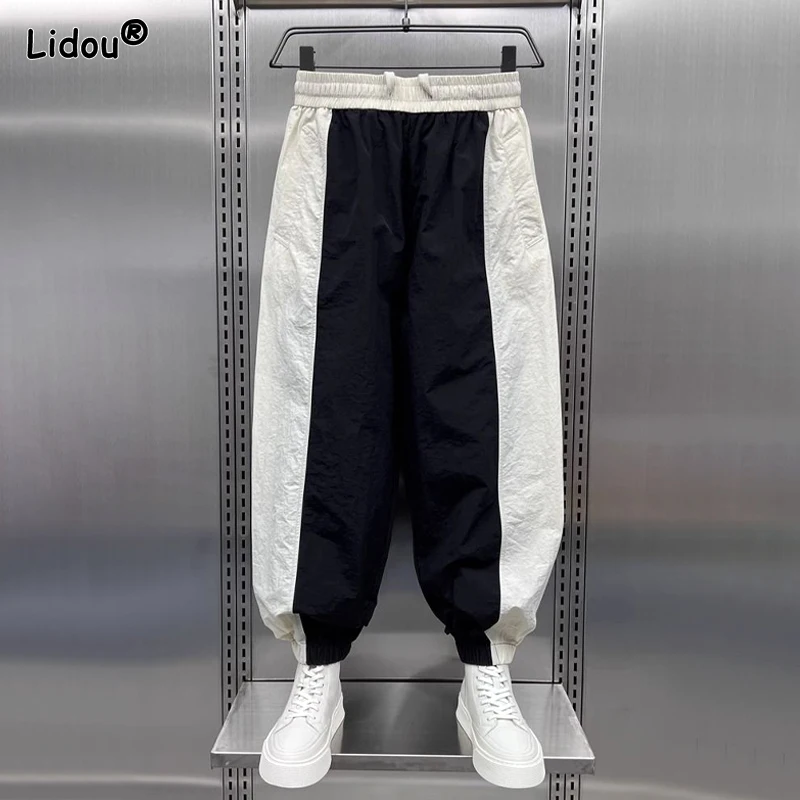 

2023 Autumn and Winter Men's New High Waist Elastic Splice Lace Pocket Loose Band Mouth Fashion Casual Pants for Commuting