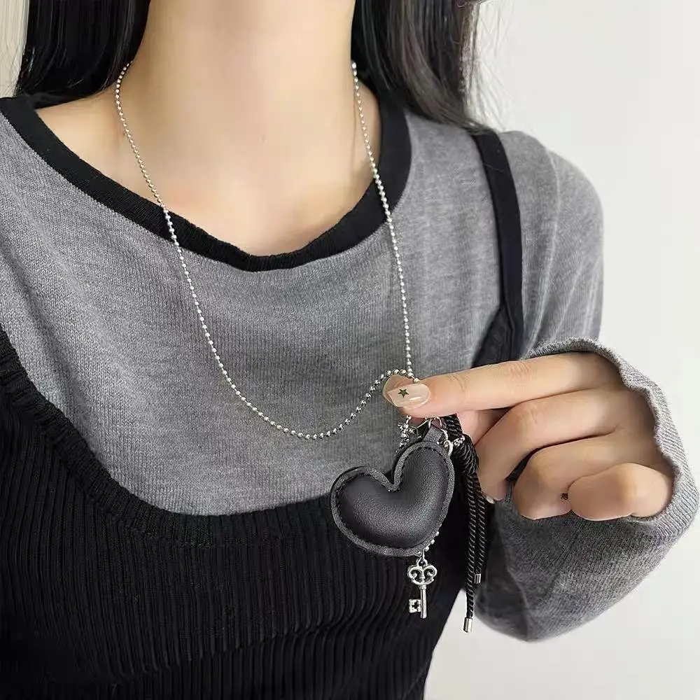 Regali di gioielli con catena per maglione stile lungo vintage Catene per maglione versatili Nicchia Ins Pendenti con borsa in metallo Collana retrò per le donne