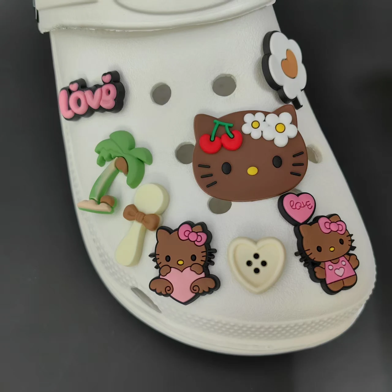 MINISO Hello Kitty Shoes Charms Brown Cat Hawaiian Themed Summer Sandal & Clog Decorations Holiday Cute Gift for Boys and Girls image 2
