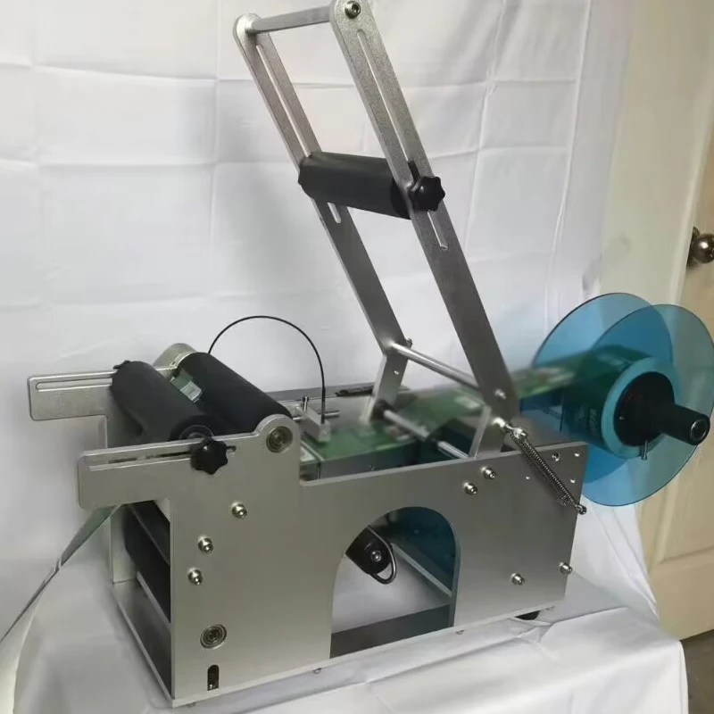Semi-automatic Intelligent Round Glass Bottle Stick Wine Beverages Jar Ungrade Labeling Machine