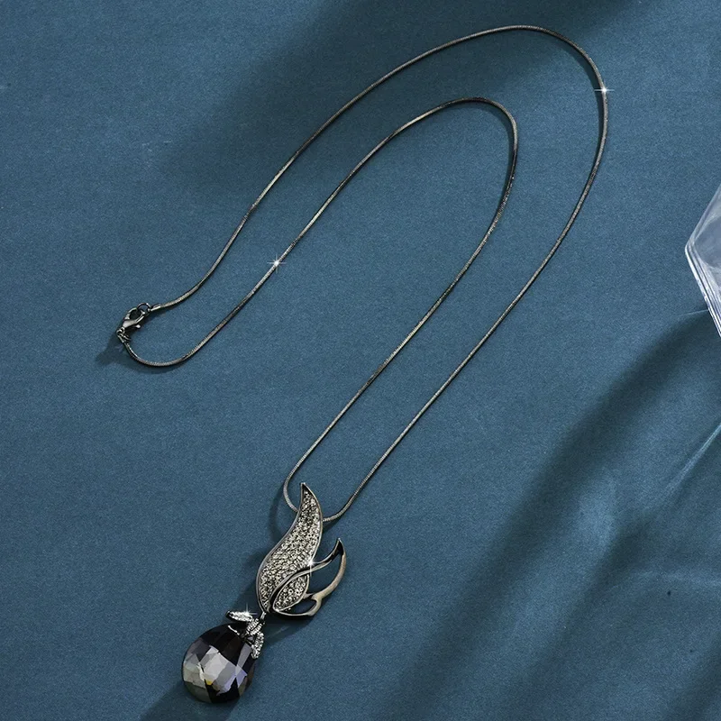 

Женская цепочка для свитера с кристаллами, длинный кристалл капли воды на осень и зиму, многофункциональное колье в форме крыльев