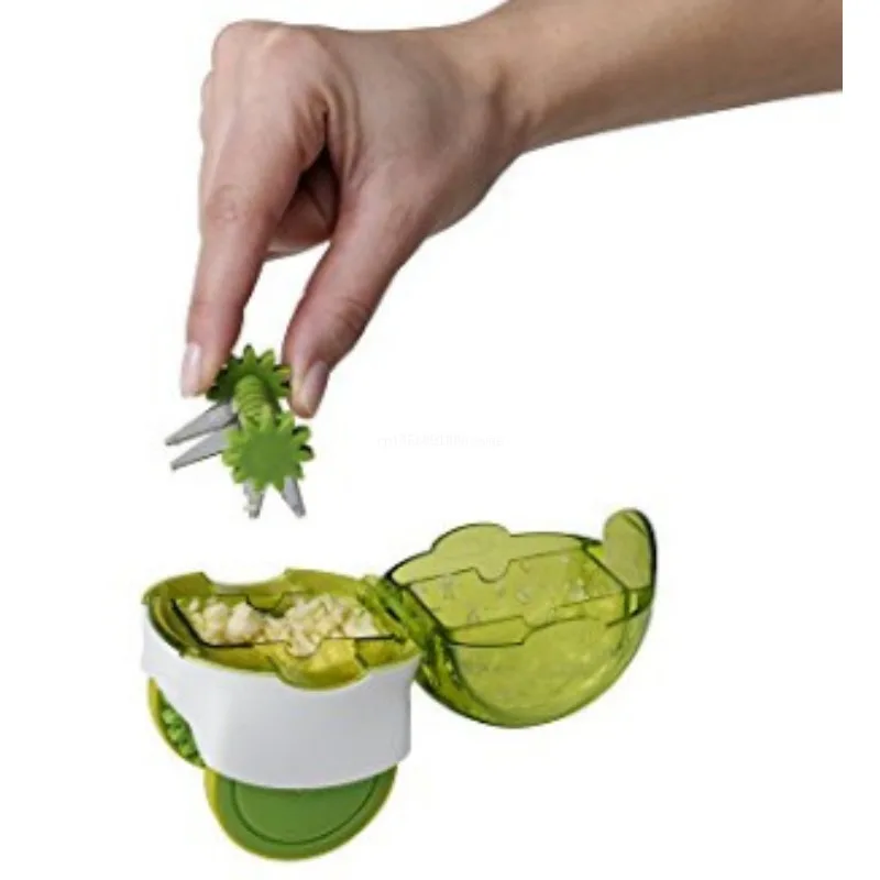 

Quick Garlic Grinder Mini Garlic Cart Kitchen Gadgets and Accessories Kitchen Gadgets Roller Garlic Chopper Manual