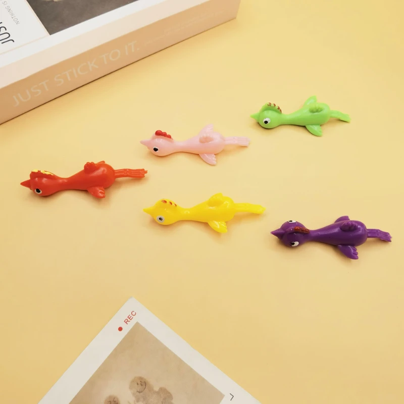 50PCS  New Little Turkey Finger Flying Dinosaur Ejection Decompression Toy Ventilating Animal Finger Dart Lalale Sticking Wall