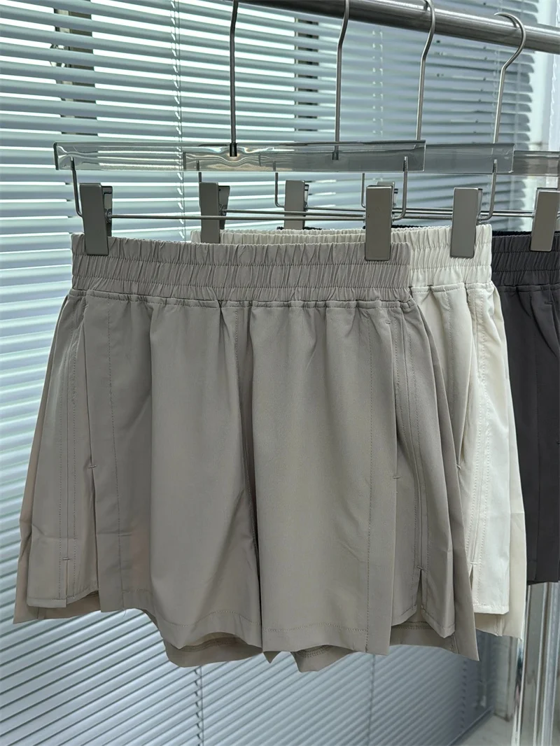 Damskie sportowe spodenki z wysokim stanem, luźny krój, oddychające, do biegania, proste nogawki, cienkie, z detalem z poliestru...