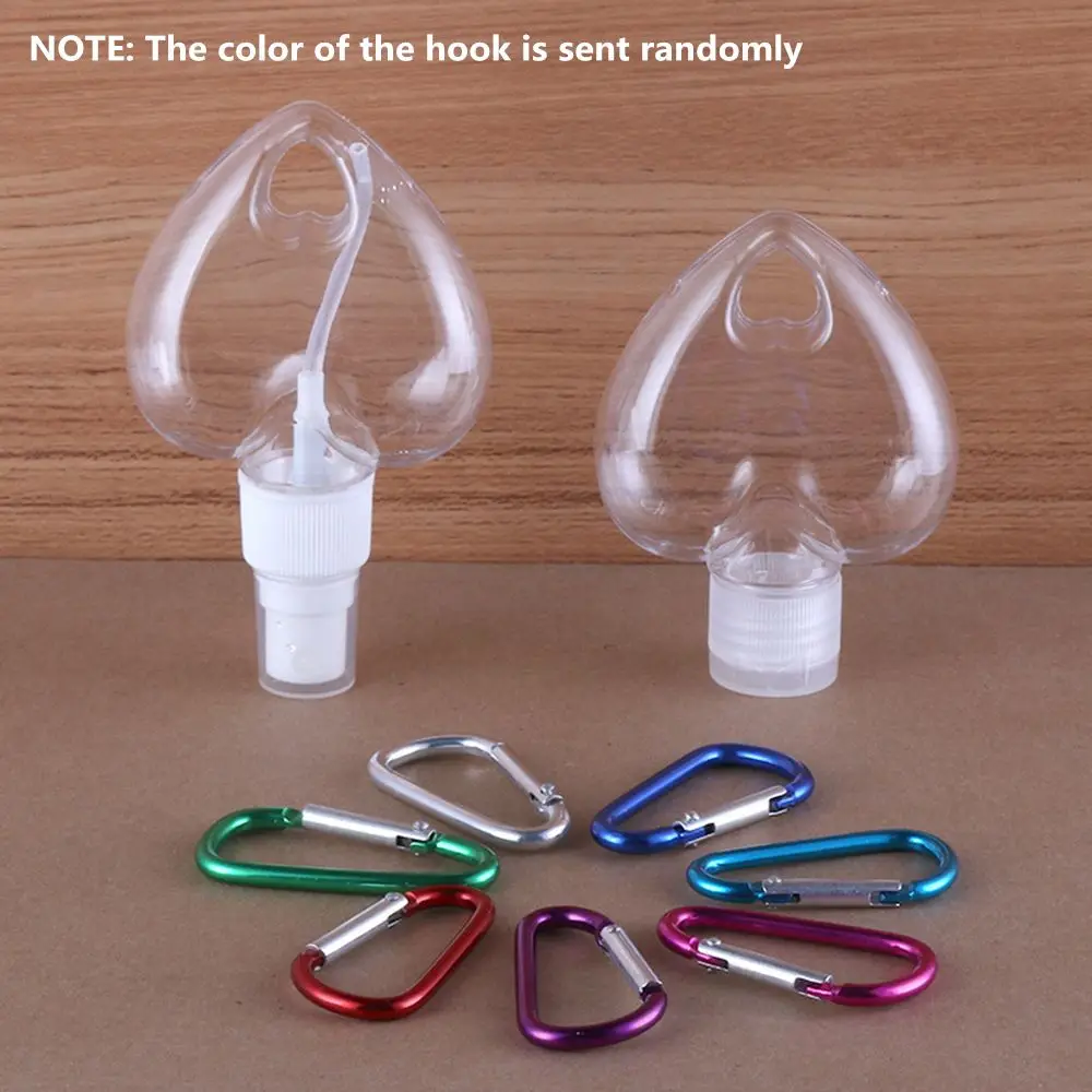 50ml Refillable Transparent Perfume Alcohol Heart Spray Bottle with Metal Hook Lotion Jar Empty Container Bottle