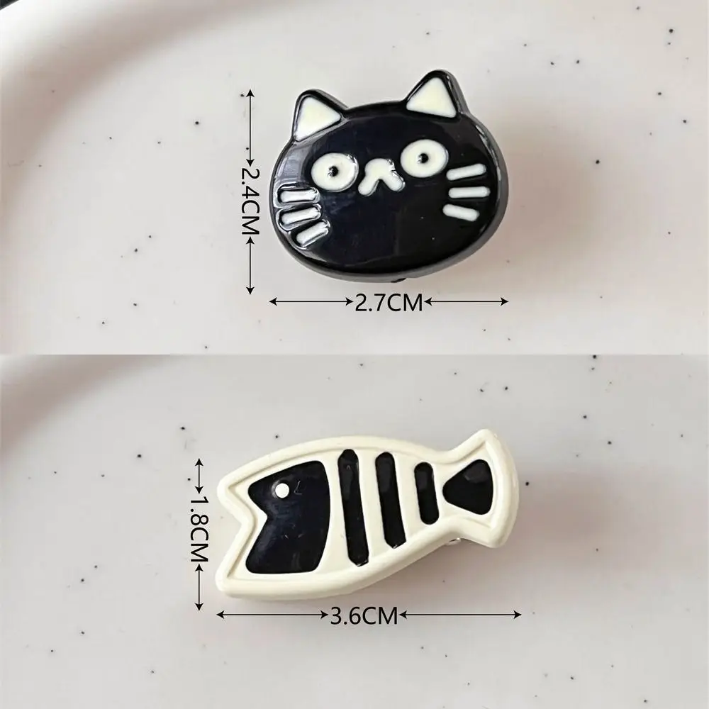 กิ๊บติดผมรูปปลาการ์ตูนน่ารักกิ๊บติดผมเรซิ่นเครื่องประดับผมสำหรับเด็กผู้หญิงกิ๊บติดผมสีดำสีขาว