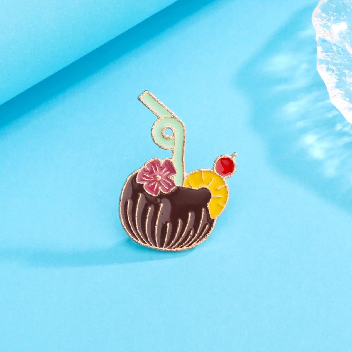 Beach holiday Lie on the beach up a coconut with a slice of lemon and a cherry creative coconut brooch