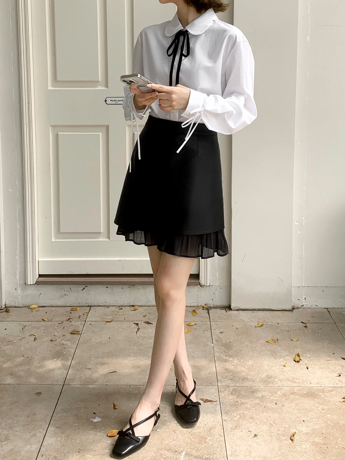 

Black Short Leather Skirt Asymmetric Design Mesh Splicing Truffle Fish Tail Style Summer Fashionable Half Skirt for Women
