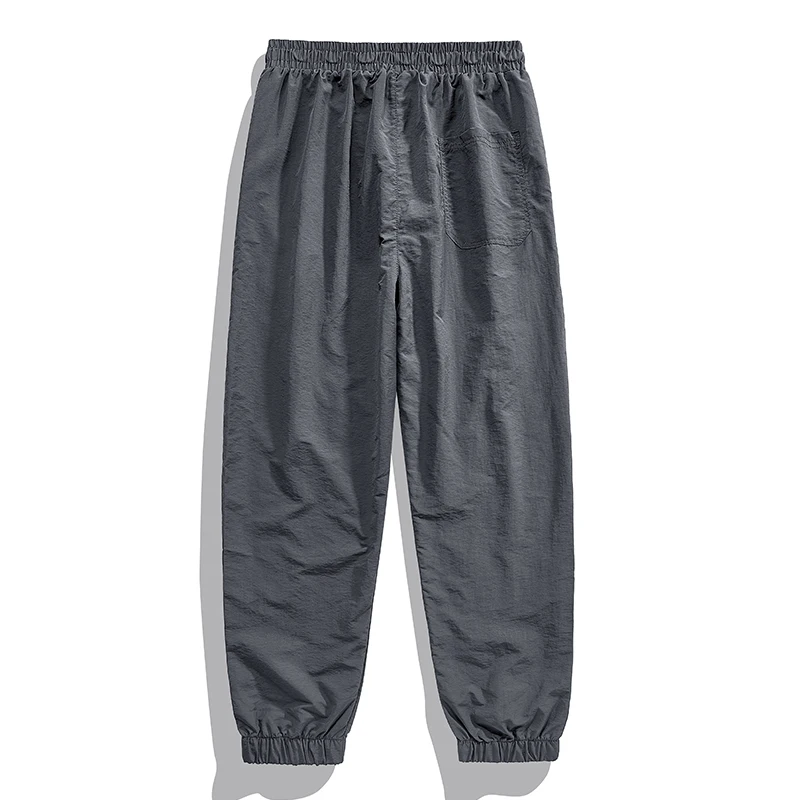 New Summer Men'S Thin Breathable Sports Pants Korean Version Fashionable Youth Casual Loose Outdoor Quick Drying 9-Point Trouser