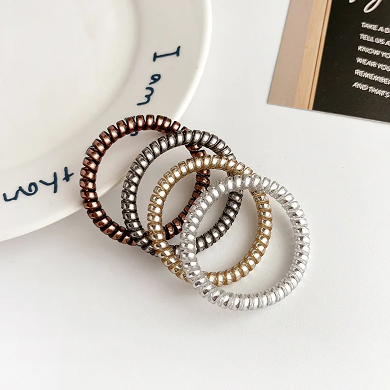 

4 Pcs/Lot Thin Telephone Wire Hair Bands Rope Gum Hair Ring Spiral Rubber Bands Shinning Gold Silver Accessories For Women Girl