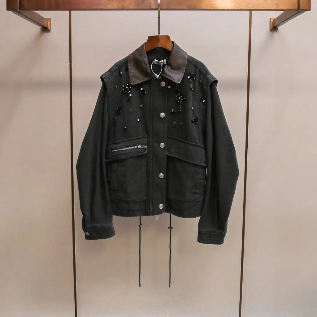

Shenzhen Nanyou High-End Women's Vintage Stitching Leather Lapel Jacket Coat Fashion Nail Bead Decoration Drawstring Top