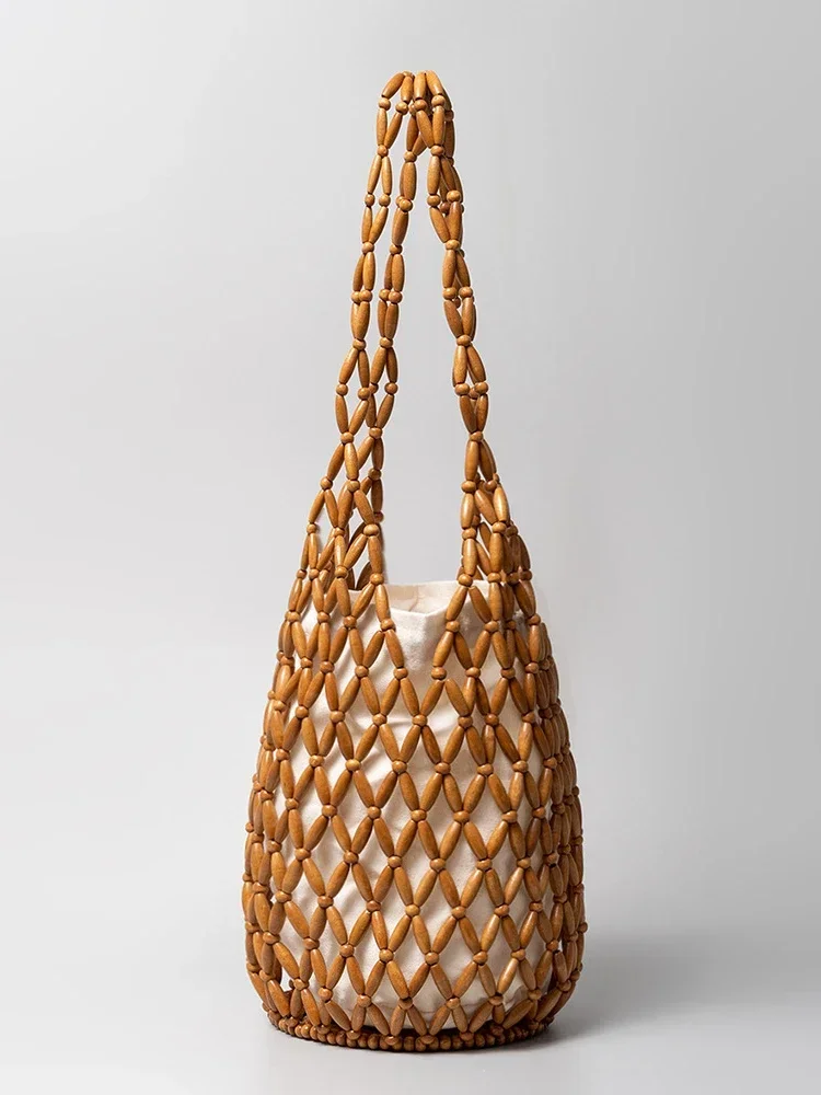 Literdesign-Sac tissé pour femme, sac seau évidé, sac à main de plage haut de gamme, sac à bandoulière, été, nouveau modèle, 2024