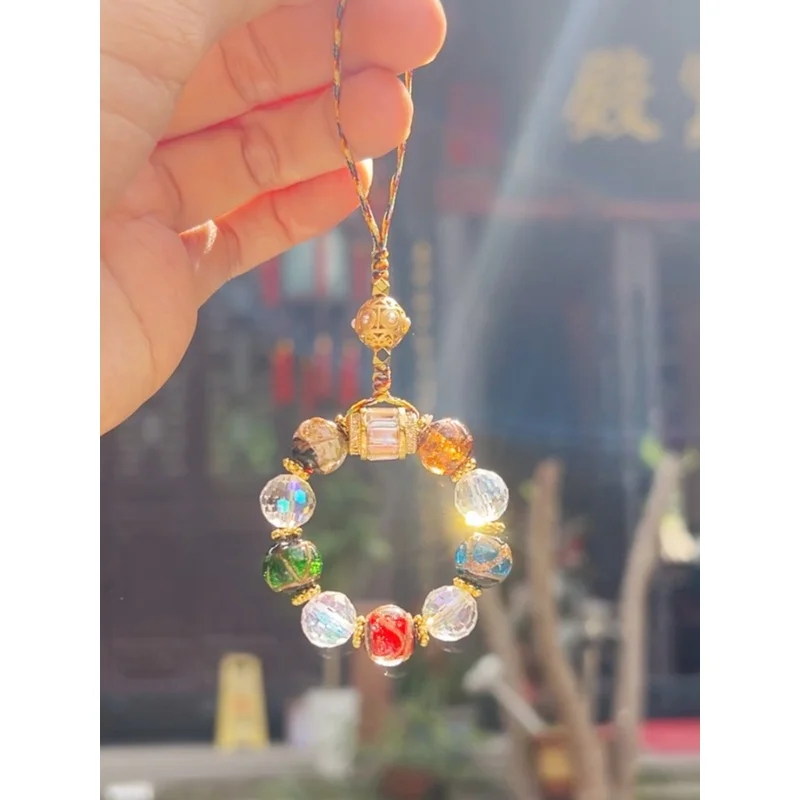 Ash-colored glazed glass , a small five-blessings mobile phone chain, car pendant, keychain  and USB drive/bag charm – a pe