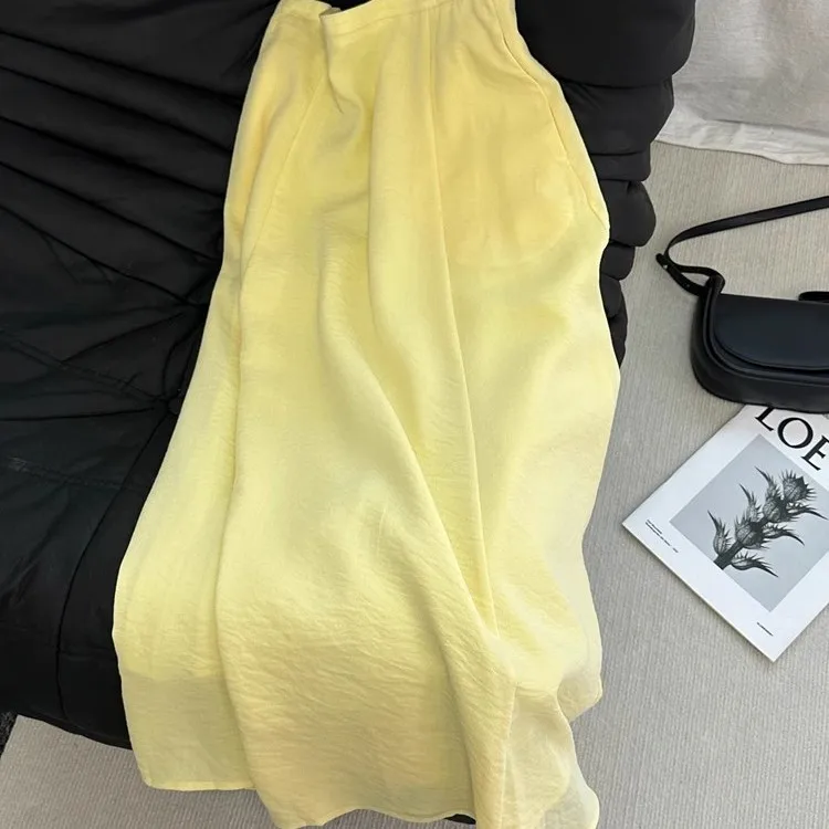 กระโปรงทรงเอเอวสูงผ้าไหมน้ำแข็งสีเหลืองสำหรับผู้หญิง แฟชั่นฤดูร้อน สไตล์ลำลอง ทรงหลวม สีซันเดด ทรงร่ม