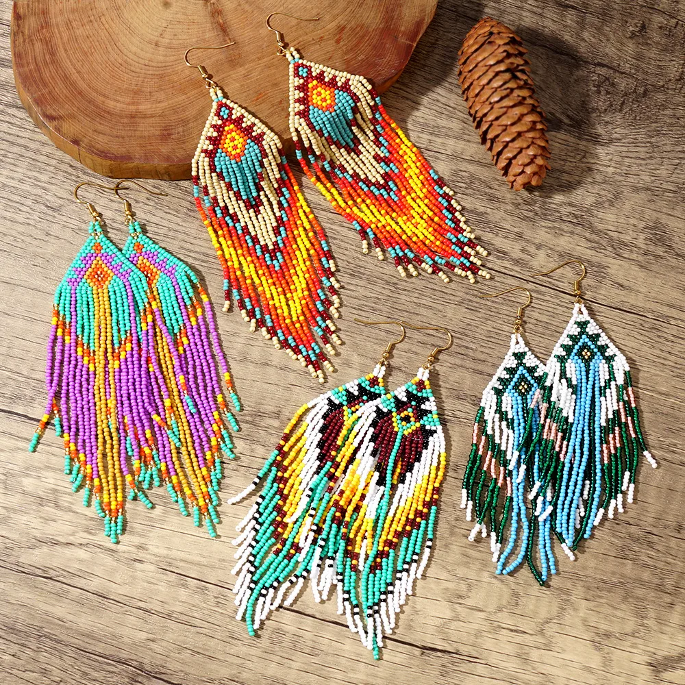 

Beaded earrings Tassel Geometry Design Innovate Gradient Hand knitting Bohemia Alloy Tide Simple Rice bead earrings