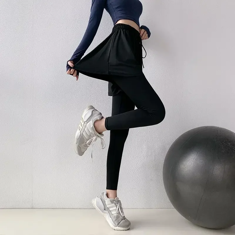 Pantaloni slim a vita alta da donna primaverili in due pezzi finti Pantaloni fitness con forza elastica in vita con coulisse in vita tinta unita