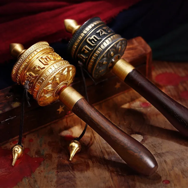 Relief hand-cranked golden mandala with the six-syllable mantra, Tibetan Buddhist Mani wheel