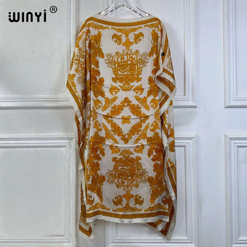 Letnie sukienki WINYI seksowne afrykańskie kobiety w rozmiarze free dress boho print plażowe sukienki imprezowe Femme kaftan muzułmańskie okrycie