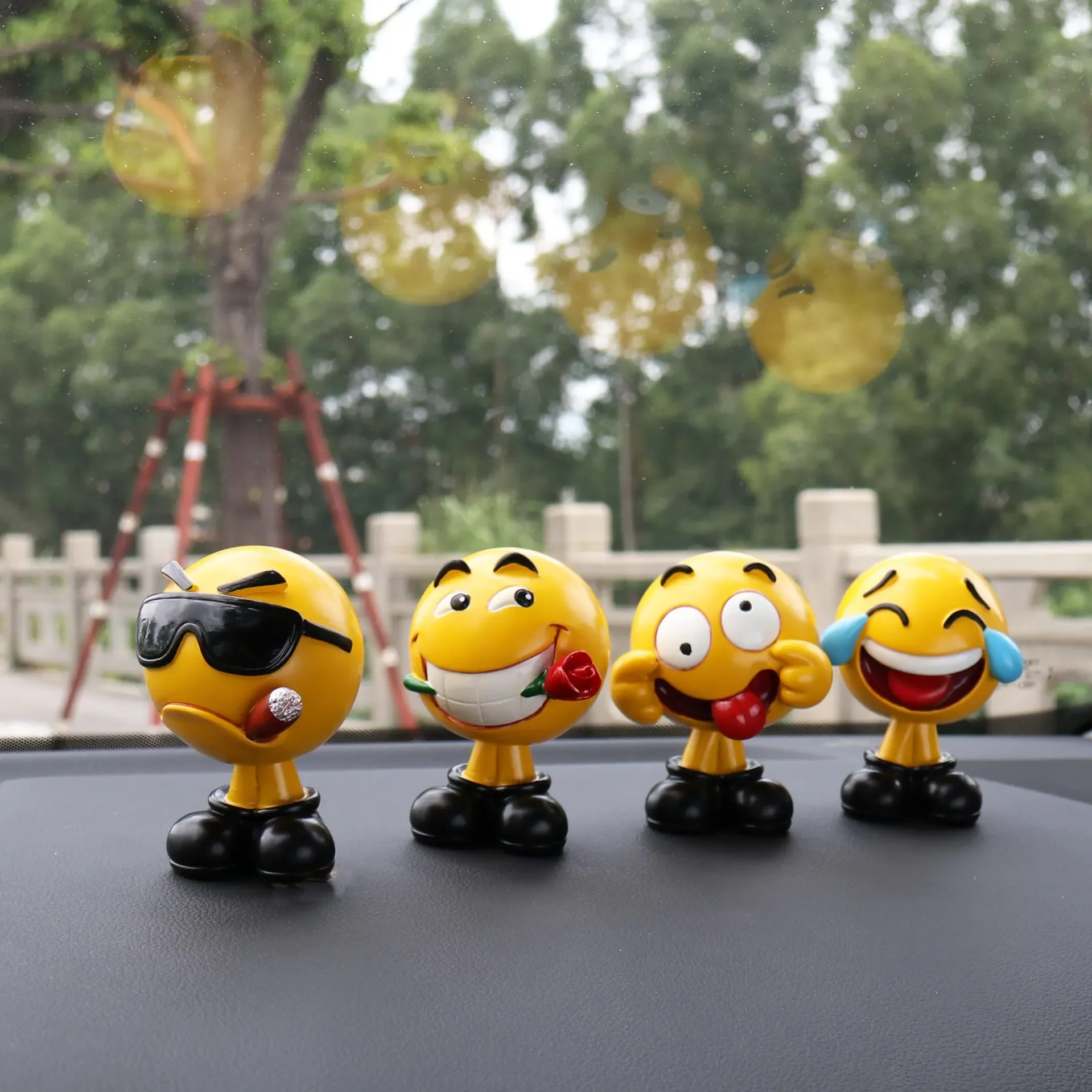 Car decoration creative shaking head doll expression bag cute cartoon car personality decoration products