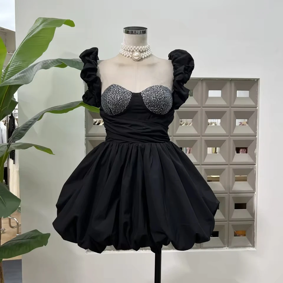

Glamorous Black Off-Shoulder Mini Dress with Crystal-Embellished Bodice and Puff Skirt for Party Nights