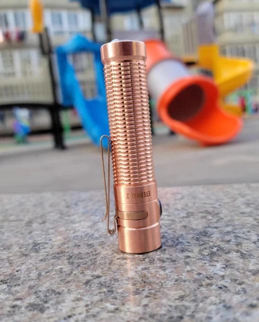 EDC OLIGHT copper flashlight Decompression toys