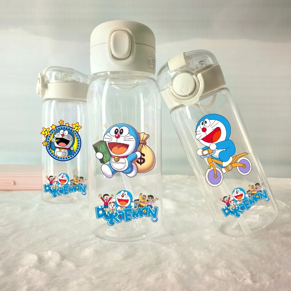 

400/600ml Doraemons Transparent Flip-top Water Cup with Straw, Portable Outdoor Sports Drinking Bottle Coffee Cup Children Gift