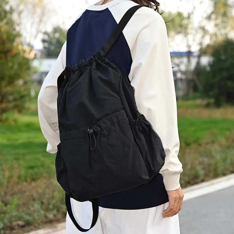 Mochila unisex, mochila escolar, tendencia para exteriores, ligera, de gran capacidad, impermeable, con cordón, bolsa de