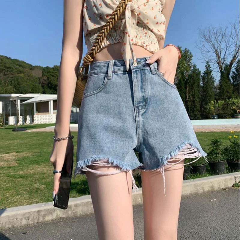 Pantaloncini di jeans effetto consumato a vita alta Donna Estate Nuovo coreano Pantaloni larghi a gamba larga A-Line Pantaloncini caldi Design con foro irregolare NZ026