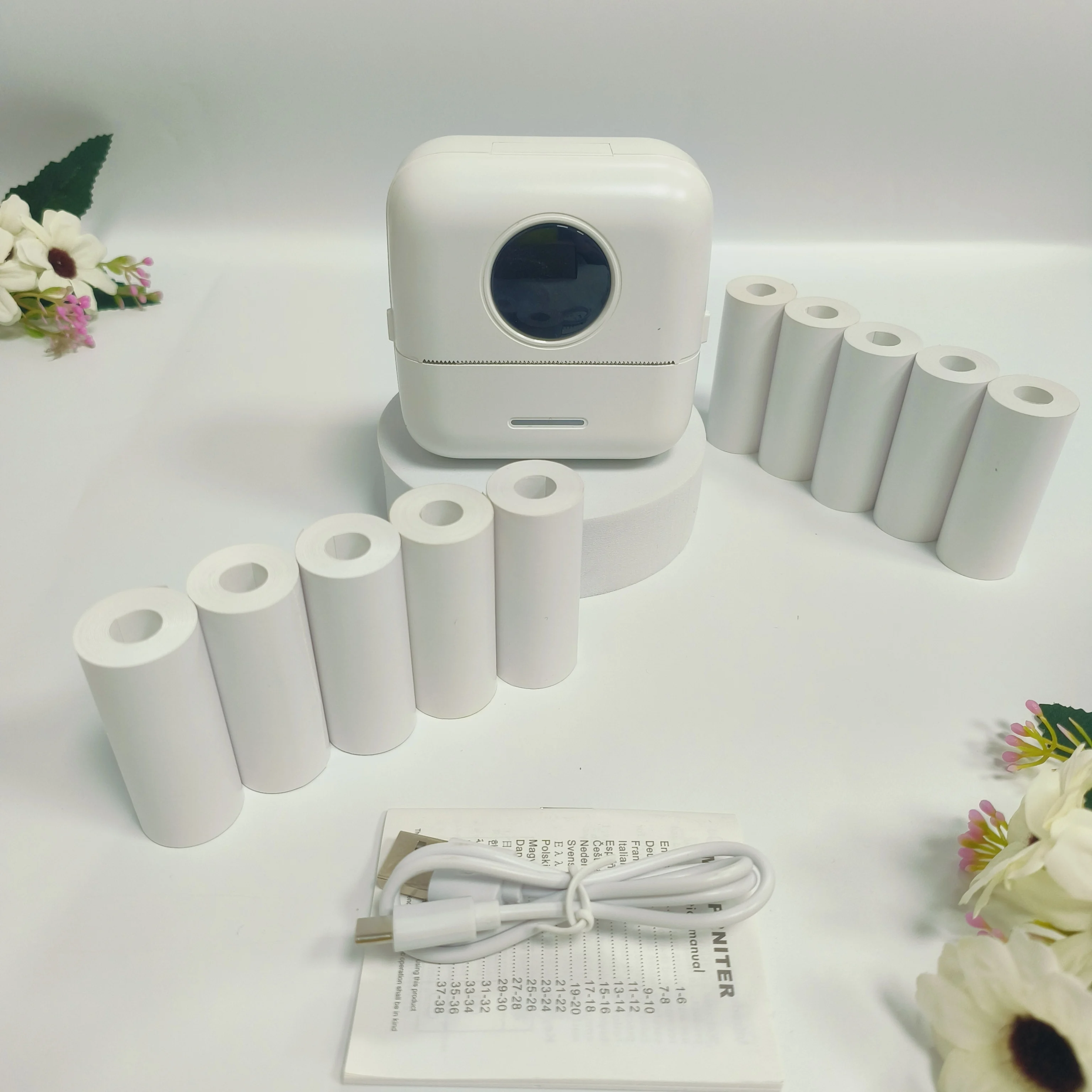 

Портативный мини-термопринтер Bluetooth с 10 рулонами бумаги, встроенным перезаряжаемым аккумулятором и функцией печати без чернил для фотографий/этикеток